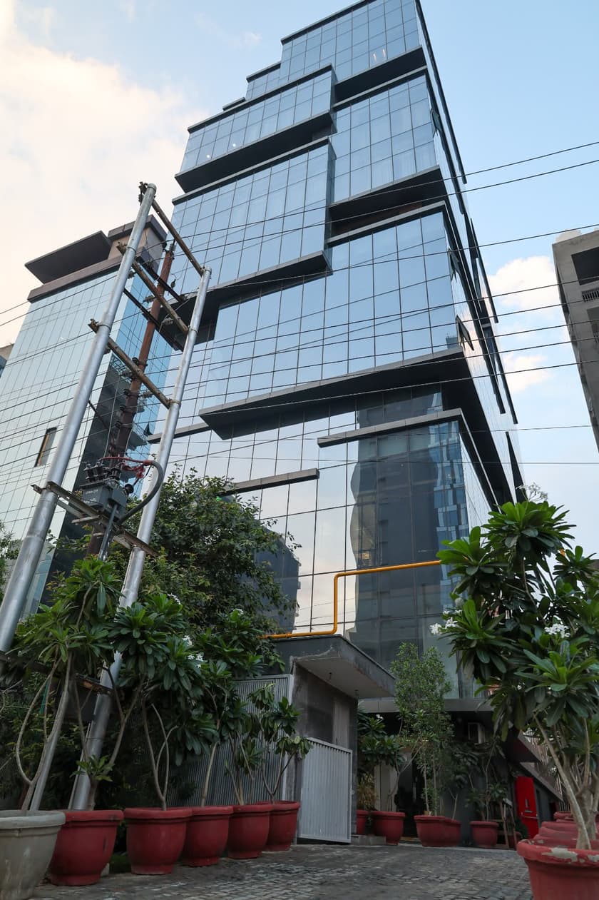 Aquila Grand Suite building exterior, daytime view.