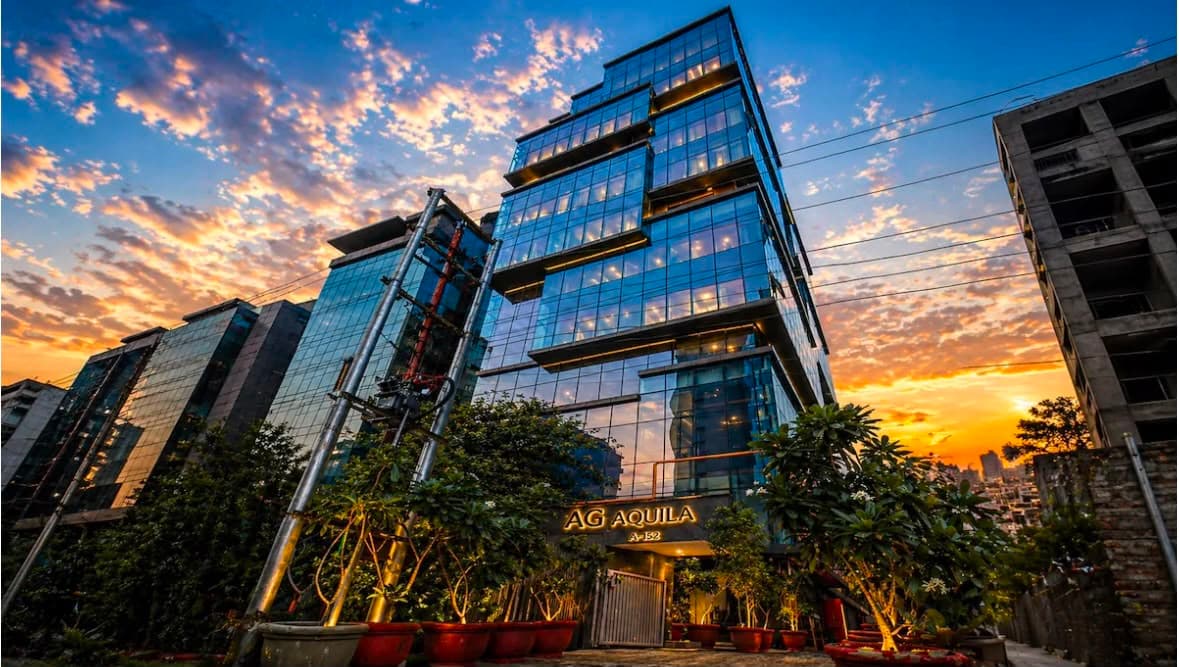 Aquila Grand Suite exterior at sunset.