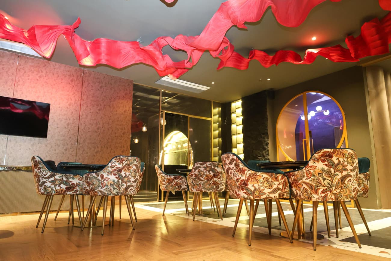 SkyLyf Café bar and lounge interior with warm ambient lighting.