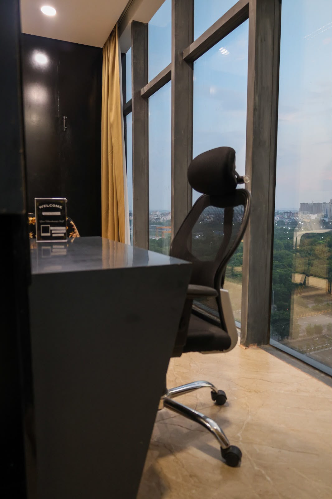 Sky Studio bedroom with warm ambient lighting.